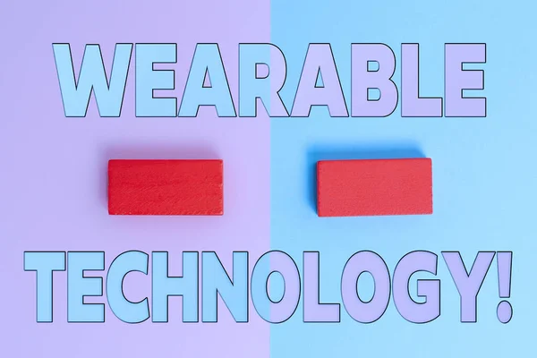 Inspiration showing sign Wearable Technology. Word for electronic devices that can be worn as accessories Two Objects Arranged Facing Inward Outward On a Separated Coloured Background — Stock Photo, Image