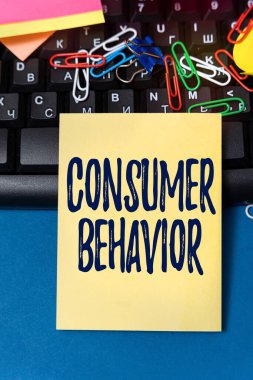 Conceptual display Consumer Behavior. Business approach study of how individual customers interacts with the brand Multiple Assorted Collection Office Stationery Photo Placed Over Table