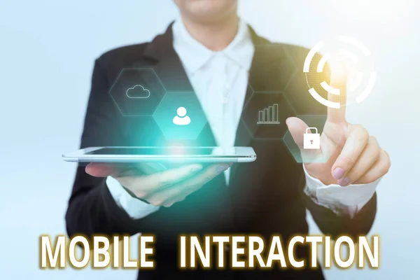 Text caption presenting Mobile Interaction. Business idea the interaction between mobile users and computers Woman In Suit Holding Tablet Pointing Finger On Futuristic Virtual Button. — ストック写真