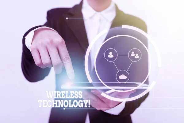 Text showing inspiration Wireless Technology. Word for a technology that allows wireless communication Lady In Suit Pointing On Tablet Showing Futuristic Graphic Interface. — Foto de Stock