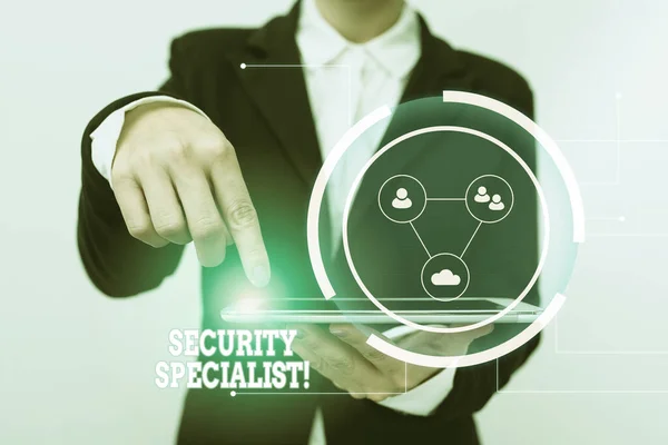 Handwriting text Security Specialist. Concept meaning specializes in the security of showing assets or systems Lady In Suit Pointing On Tablet Showing Futuristic Graphic Interface. —  Fotos de Stock