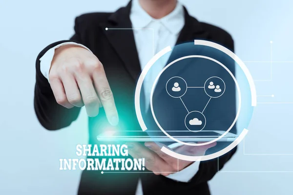 Text sign showing Sharing Information. Business showcase exchange of data between various organizations Lady In Suit Pointing On Tablet Showing Futuristic Graphic Interface. — Foto de Stock