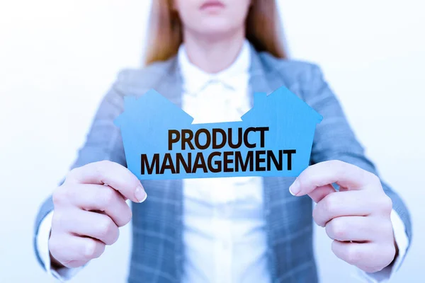 Text caption presenting Product Management. Conceptual photo organisational lifecycle function within a company A Young Lady Businesswoman Holding Presenting Home In Business Outfit — Stok fotoğraf