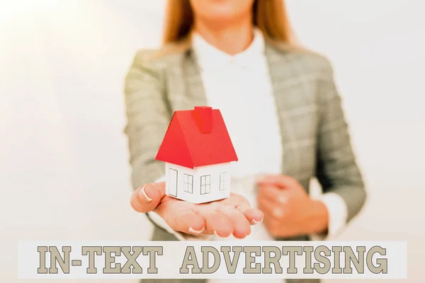 Text showing inspiration In Text Advertising. Internet Concept advertisement on the internet that contains word A Young Lady Orbusinesswoman Holding Orpresenting Home In Business Outfit — стоковое фото