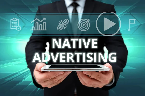Writing displaying text Native Advertising. Internet Concept paid media where the ad experience follows the usual form Man In Office Uniform Holding Tablet Displaying New Modern Technology. — ストック写真