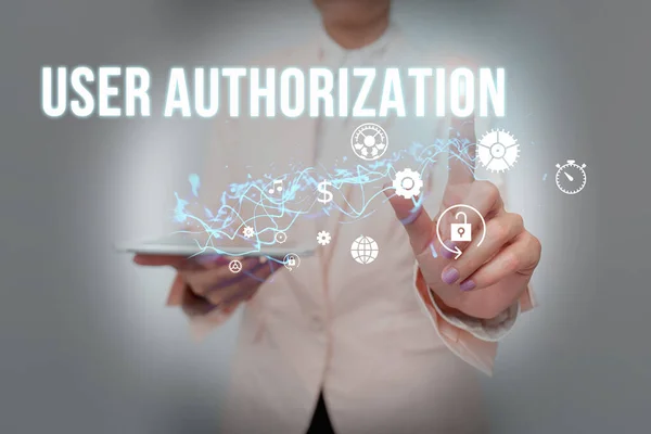 Text sign showing User Authorization. Business idea security mechanism to determine access levels or user Lady In Suit Holding Phone And Performing Futuristic Image Presentation. —  Fotos de Stock