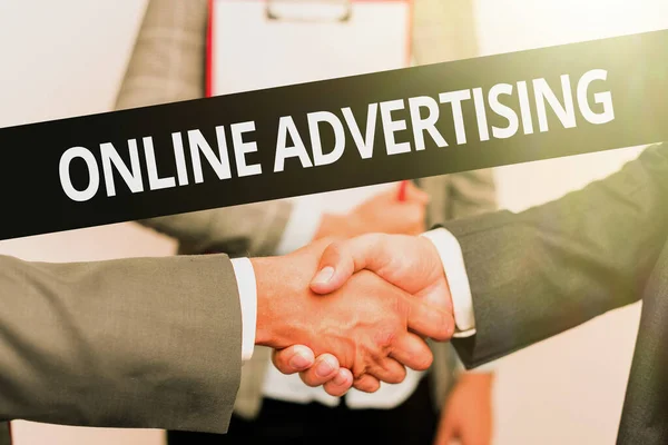 Conceptual display Online Advertising. Internet Concept uses the Internet to marketing messages to customers Two Professional Well-Dressed Corporate Businessmen Handshake Indoors — Stockfoto