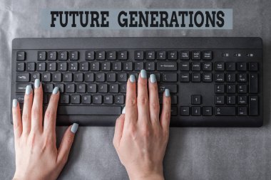 Conceptual display Future Generations. Word Written on generations to come after the currently living generation Lady Hands Pointing Pressing Computer Keyboard Keys Typewriting New Ideas.