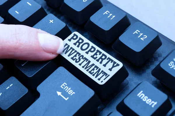 Handwriting text Property Investment. Word Written on Asset purchased and held primarily for its future income Typing New Blog Contents, Writing Movie Scripts, Creating Computer Codes — Stockfoto