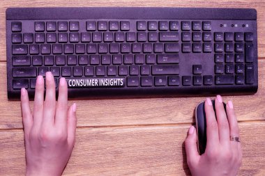 Handwriting text Consumer Insights. Internet Concept understanding customers based on their buying behavior Hands Pointing Pressing Computer Keyboard Keys Typewriting New Ideas.