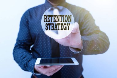 Conceptual caption Retention Strategy. Business overview activities to reduce employee turnover and attrition Presenting New Technology Ideas Discussing Technological Improvement