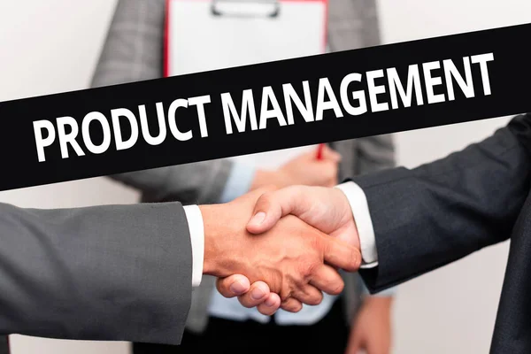 Text sign showing Product Management. Concept meaning organisational lifecycle function within a company Two Professional Well-Dressed Corporate Businessmen Handshake Indoors — Stok fotoğraf