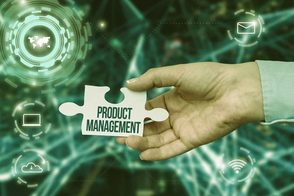 Conceptual display Product Management. Business concept organisational lifecycle function within a company Hand Holding Jigsaw Puzzle Piece Unlocking New Futuristic Technologies. — Stok fotoğraf