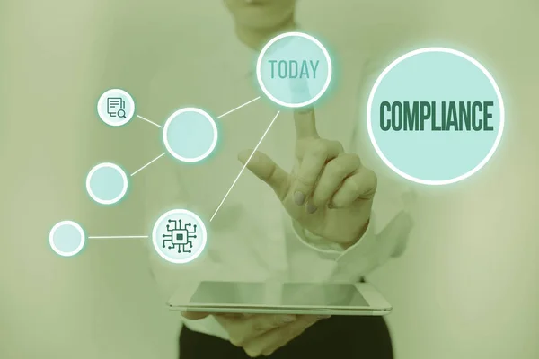 Text showing inspiration Compliance. Word Written on the action or fact of complying with a wish or commands Lady Holding Tablet Pressing On Virtual Button Showing Futuristic Tech. — Stock Photo, Image