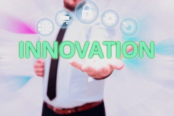 Text sign showing Innovation. Business approach new idea creative ideas fresh imaginations in the tool form process Gentelman Uniform Standing Holding New Futuristic Technologies. — Stock Photo, Image