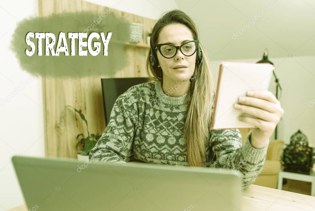 Handwriting text Strategy. Business approach action plan or strategy designed to achieve an overall goal Abstract Writing New Blog Content, Reading Online Articles And News