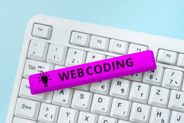 Conceptual caption Web Coding. Internet Concept a system of symbols and rules used to represent instructions Typing And Publishing Descriptions Online, Writing Informative Data