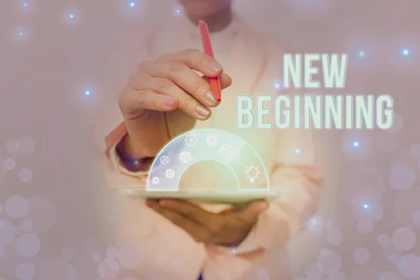 Sign displaying New Beginning. Concept meaning Different Career or endeavor Starting again Startup Renew Lady In Uniform Holding Pen Phone Showing Futuristic Virtual Interface.