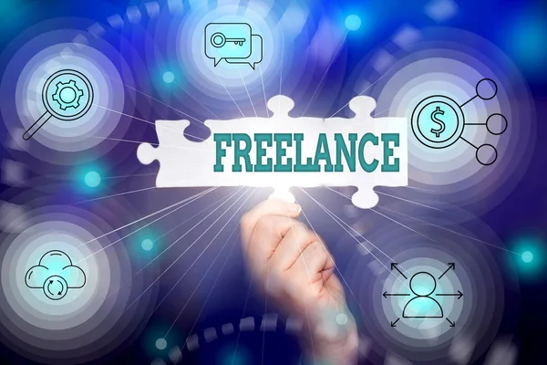 Text caption presenting Freelance. Word for working at different firms rather than being permanently Hand Holding Jigsaw Puzzle Piece Unlocking New Futuristic Technologies. — Stock Photo, Image