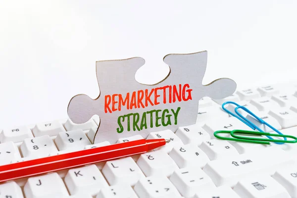 Sign displaying Remarketing Strategy. Conceptual photo reengage customers using information collected Computer Laptop For Communication Typing New Ideas And Plan Development — Stock Photo, Image