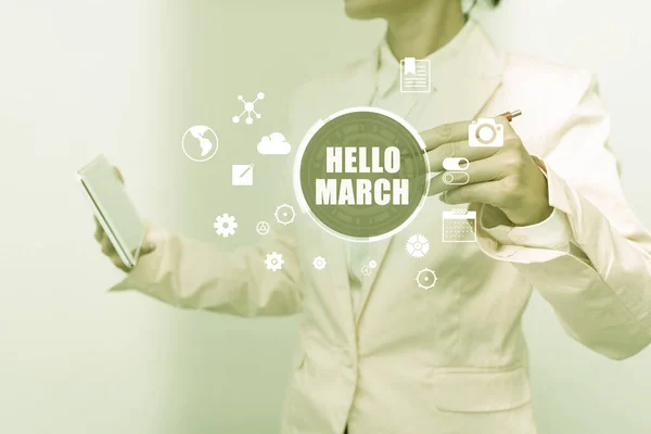 Texto presentando Hola Marzo. Word for a greeting expression used when welcoming the month of March Business Woman Touching Digital Data On Holographic Screen Interface. —  Fotos de Stock