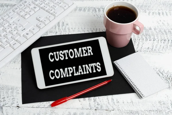 Conceptual caption Customer Complaints. Word Written on expression of dissatisfaction on a consumer s is behalf Wireless Communications Voice And Video Calls Writing Important Notes — Stock Photo, Image