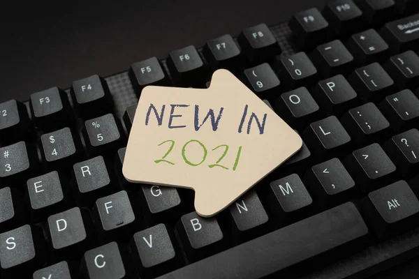 Sign displaying New In 2021. Word Written on what will be expecting or new creation for the year 2020 Creating Social Media Comment Message, Typing Fun Questions And Answers — 图库照片