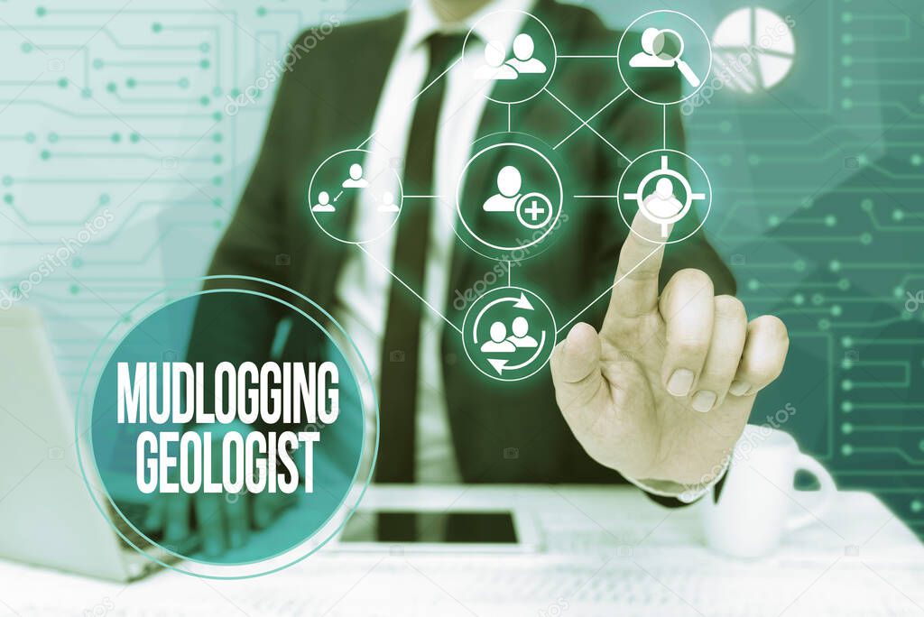 Text caption presenting Mudlogging Geologist. Conceptual photo gather information and creating a detailed well log Bussiness Man Sitting Desk Laptop And Phone Pointing Futuristic Technology.