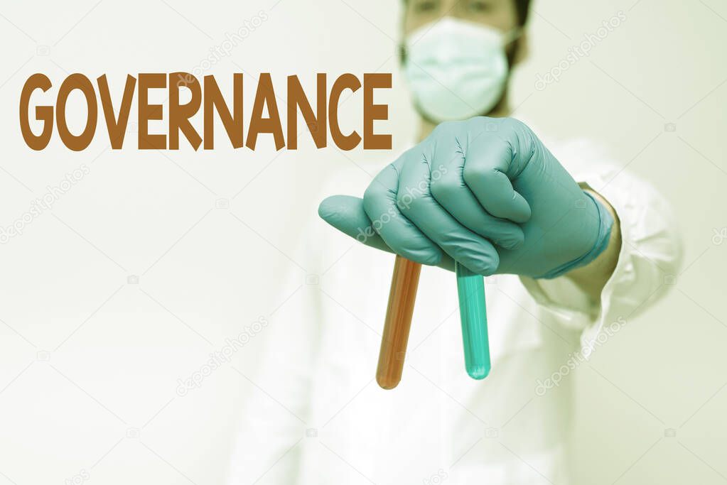 Text showing inspiration Governance. Concept meaning exercised in handling an economic situation in a nation Researcher Displaying Virus Prevention Method, New Infection Cure Ideas