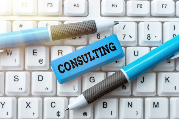 Text showing inspiration Consulting. Word for engaged in giving expert advice to experts or technicians Typing Certification Document Concept, Retyping Old Data Files — Stock Photo, Image