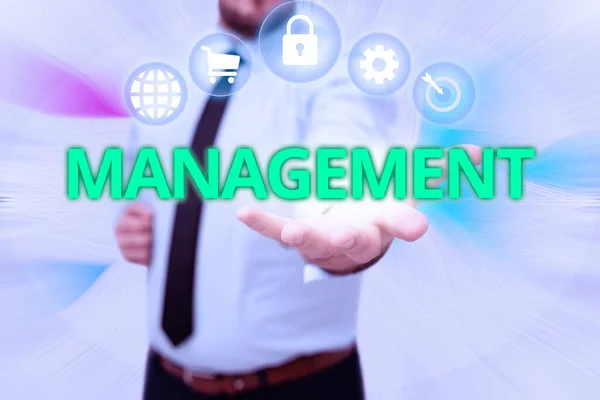 Text caption presenting Management. Business idea the authoritative act of directing or controlling things Gentelman Uniform Standing Holding New Futuristic Technologies. — Stock Photo, Image