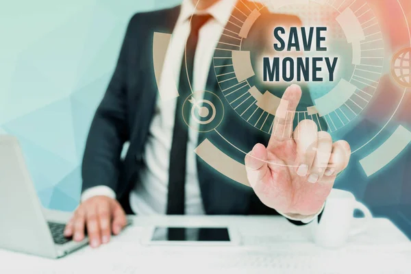 Texto mostrando inspiração Save Money. Visão geral do negócio para orçamento ou colocar o dinheiro de lado para o futuro ou emergência Empresário Homem Sentado Mesa Laptop And Phone Apontando Tecnologia Futurista. — Fotografia de Stock