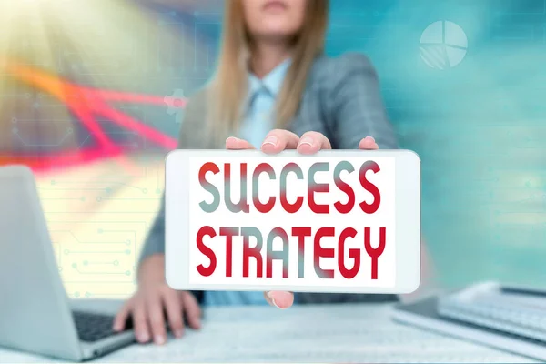 Writing displaying text Success Strategy. Concept meaning provides guidance the bosses needs to run the company Business Woman Sitting In Office Holding Mobile Displaying Futuristic Ideas. — Stockfoto