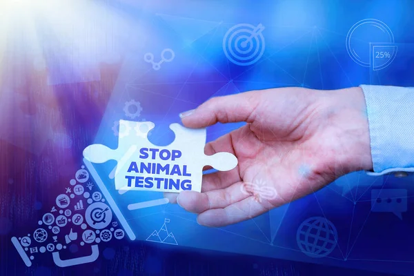 Sign displaying Stop Animal Testing. Conceptual photo put an end on animal experimentation or research Hand Holding Jigsaw Puzzle Piece Unlocking New Futuristic Technologies. — Stock Fotó