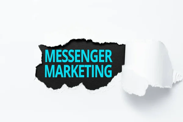 Handwriting text Messenger Marketing. Internet Concept act of marketing to your customers using a messaging app Tear on sheet reveals background behind the front side — Stockfoto