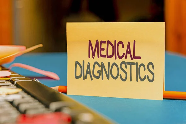 Conceptual caption Medical Diagnostics. Word Written on a symptom or characteristic of value in diagnosis Multiple Assorted Collection Office Stationery Photo Placed Over Table — Stockfoto