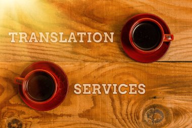 Hand writing sign Translation Services. Business overview organization that provide showing to translate speech Stack of Sample Cube Rectangular Boxes On Surface Polished With Multi-Colour clipart