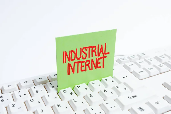 Conceptual caption Industrial Internet. Concept meaning use of the internet of things in industrial sectors Computer Laptop For Communication Typing New Ideas And Plan Development