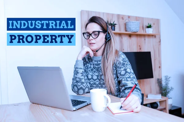 Text showing inspiration Industrial Property. Word Written on the intangible ownership of a trademark or patent Callcenter Agent Working From Home, Student Preparing For Examinations