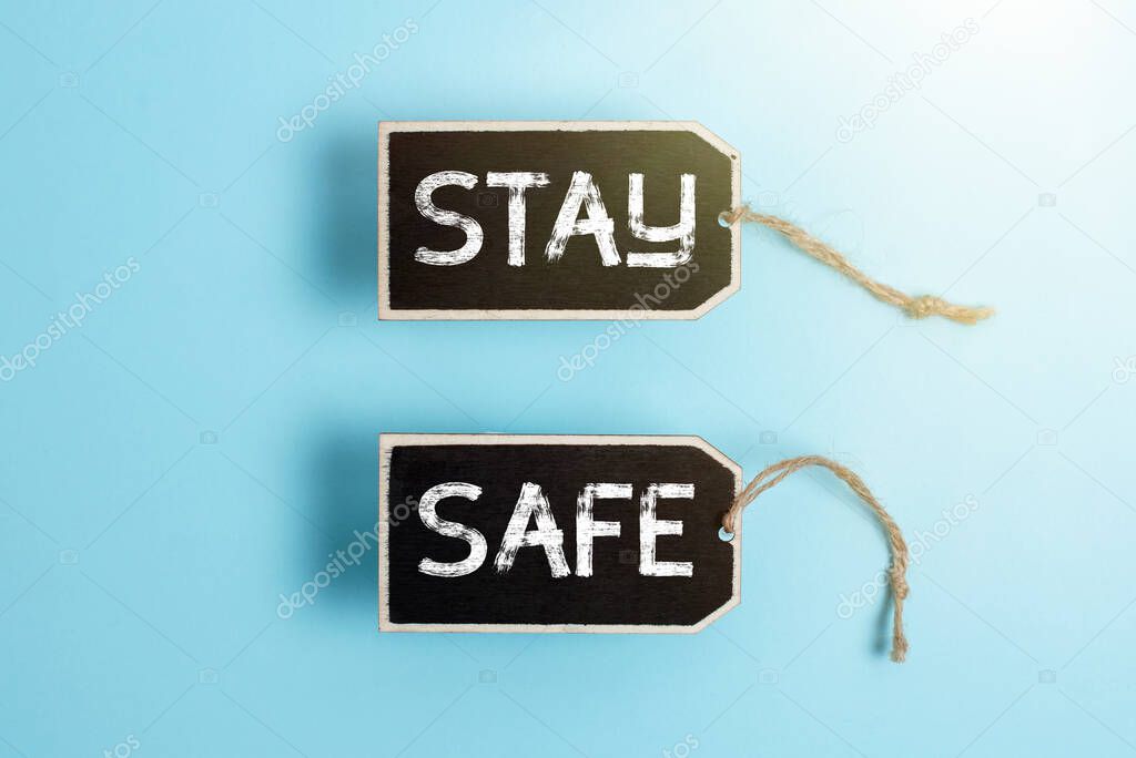 Text sign showing Stay Safe. Business concept secure from threat of danger, harm or place to keep articles Collection of Blank Empty Sticker Tags Tied With A String For Information Label Sign
