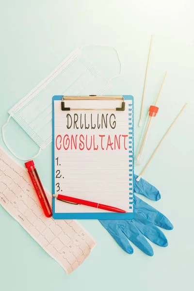 Hand writing sign Drilling Consultant. Business showcase onsite supervision of daytoday drilling operations Writing Important Medical Notes Laboratory Testing Of New Virus Medicine