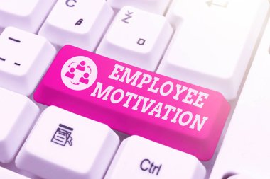 Çalışan Motivasyonunu gösteren bir tabela. Enerji üzerine yazılan bir sözcüğe göre, işçiler işlerine hızlı yazma dersleri ve tavsiyeler vererek, klavye doğruluğunu geliştirerek devam ediyorlar.