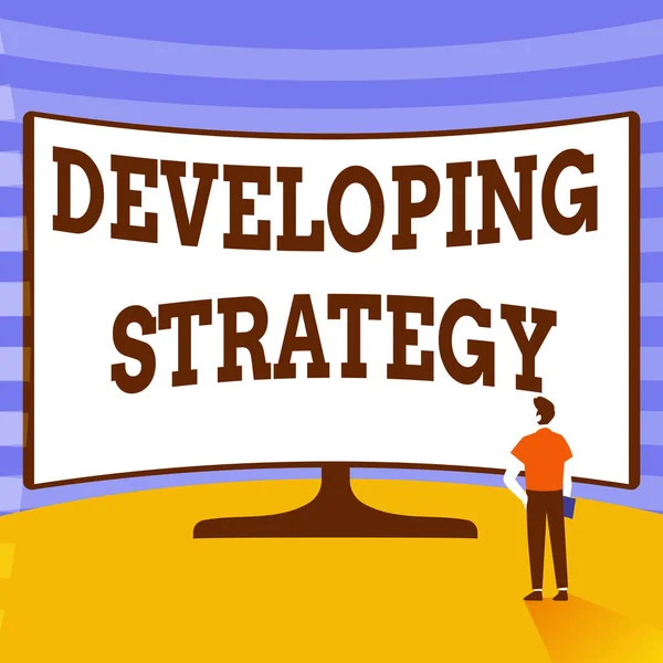 Teken Ontwikkelings Strategie. Conceptuele foto Game plan dat specifieke doelen en doelstellingen stelt Man Standing Illustration Staande voor Enorme Display Screen. — Stockfoto