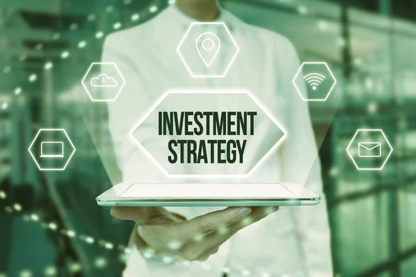Text sign showing Investment Strategy. Business showcase the systematic plan to allocate investable assets Lady In Uniform Holding Tablet In Hand Virtually Typing Futuristic Tech. — Stock Photo, Image