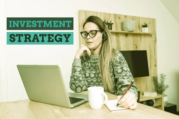 Text sign showing Investment Strategy. Business showcase the systematic plan to allocate investable assets Callcenter Agent Working From Home, Student Preparing For Examinations — Stock Photo, Image