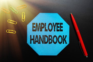 Text caption presenting Employee Handbook. Conceptual photo states the rules and regulations and policies of a company Thinking New Bright Ideas Renewing Creativity And Inspiration