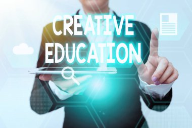 Inspiration showing sign Creative Education. Business overview students able to use imagination and critical thinking Woman In Suit Holding Tablet Pointing Finger On Futuristic Virtual Button.
