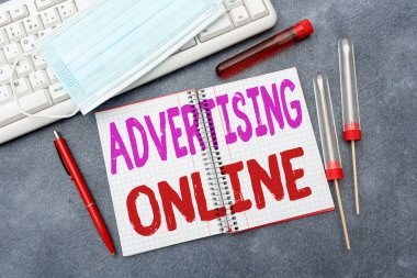 Text showing inspiration Advertising Online. Internet Concept marketing strategy that involves the use of the Internet Typing Medical Notes Scientific Studies And Treatment Plans
