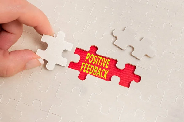 Handwriting text Positive Feedback. Business showcase good and great comments coming from satisfied customers Building An Unfinished White Jigsaw Pattern Puzzle With Missing Last Piece — Fotografia de Stock
