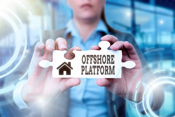 Sign displaying Offshore Platform. Word for structure with facilities for well drilling to explore Business Woman Holding Jigsaw Puzzle Piece Unlocking New Futuristic Tech. — Φωτογραφία Αρχείου